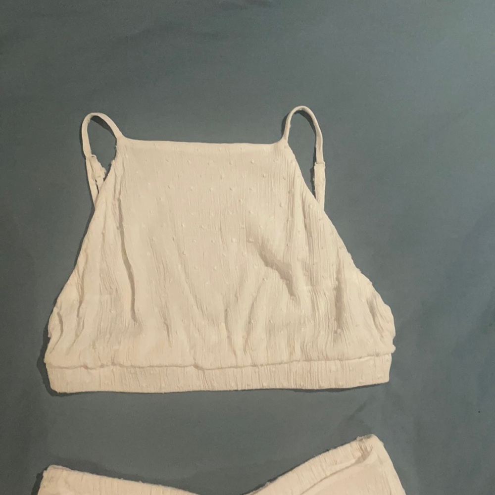 2 piece white tank and pants. From buckle